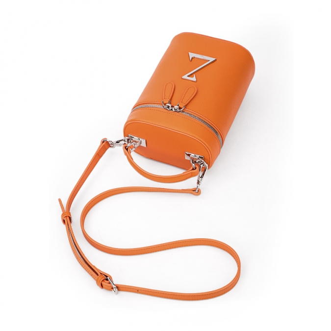 Bolso tipo cubo de cuero genuino de color naranja 2021 para damas con logotipo personalizado 